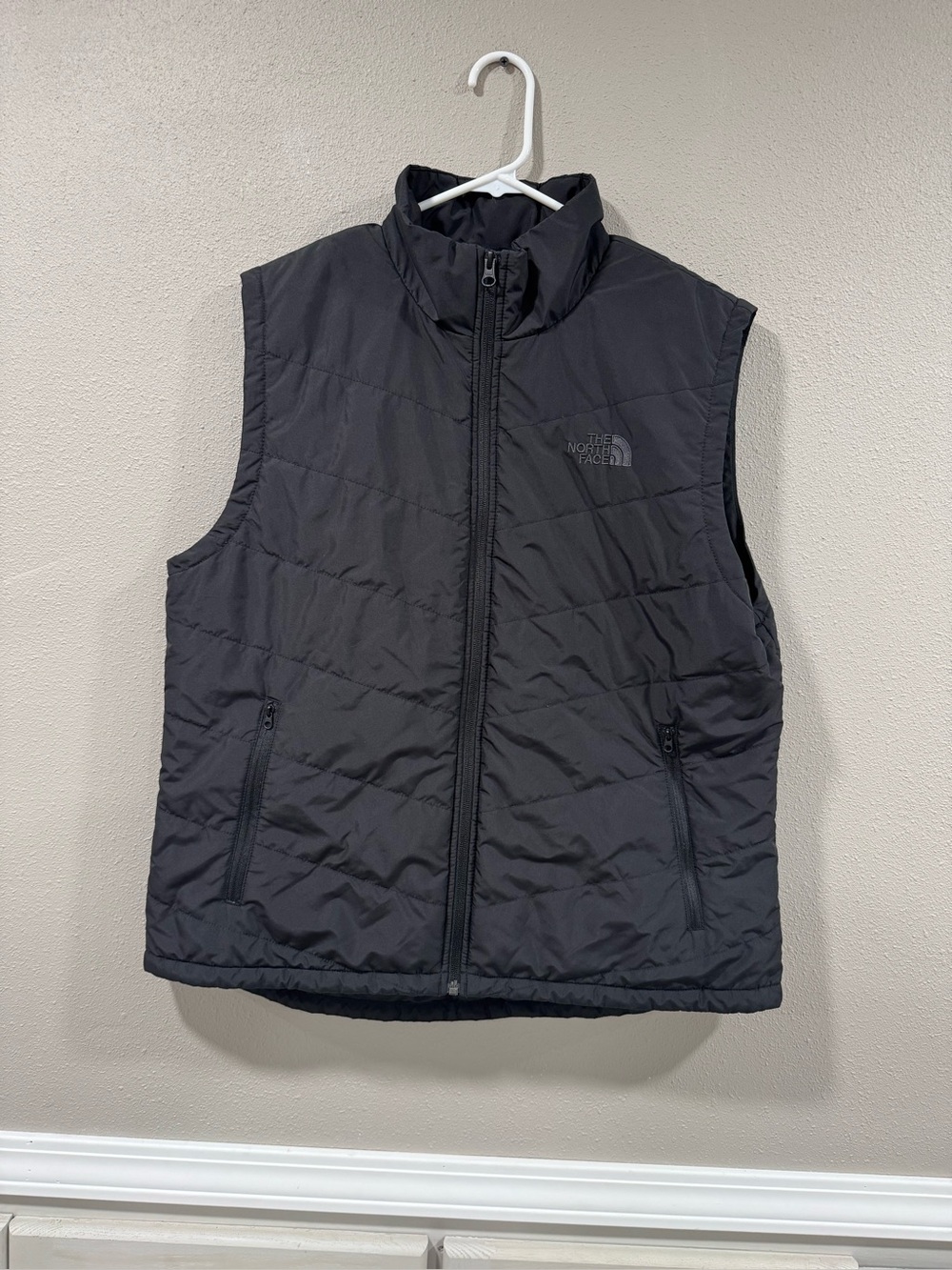 The North Face Men's Black Puffer Vest with Zip Pockets